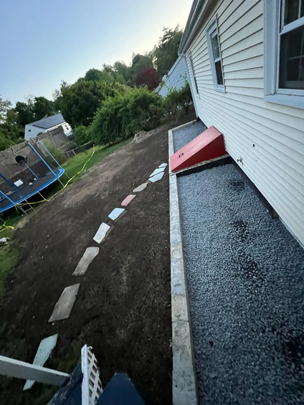 Gravel drainage strip along a house