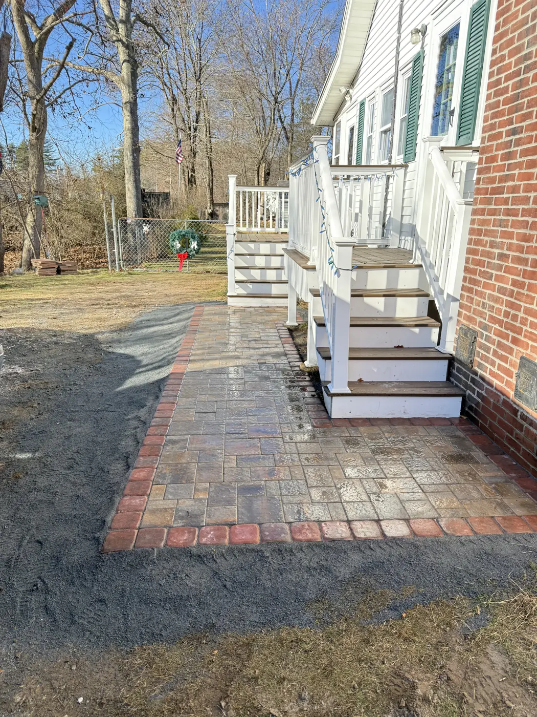 Paver walkway with brick border